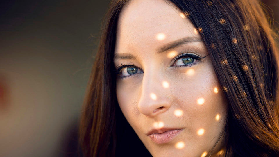  Woman with glowing radiant skin beauty portrait